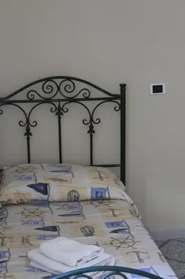 Letto o letti in una camera di Siracusa Tribe House