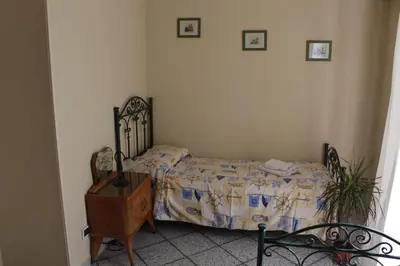 Letto o letti in una camera di Siracusa Tribe House