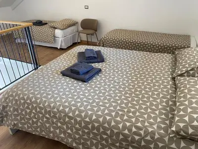 Letto o letti in una camera di Sorrentino House