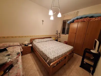 Letto o letti in una camera di Terrazza Sul Mare