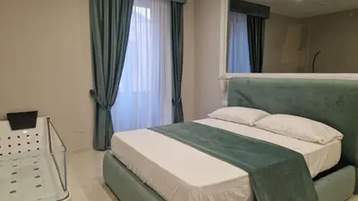 Letto o letti in una camera di L'Arte del Porto