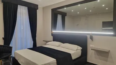 Letto o letti in una camera di L'Arte del Porto