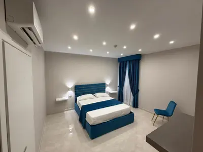 Letto o letti in una camera di L'Arte del Porto