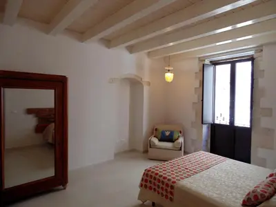 Letto o letti in una camera di Allegrakori