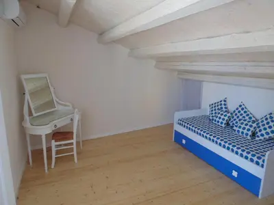 Letto o letti in una camera di Allegrakori