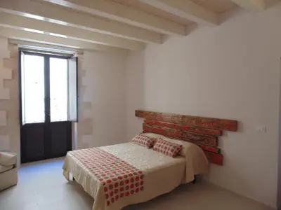 Letto o letti in una camera di Allegrakori