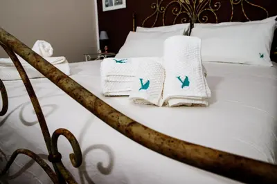 Letto o letti in una camera di A Casa da Nelly Augusta