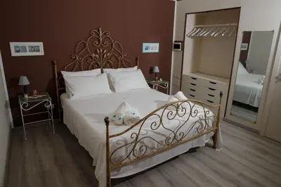 Letto o letti in una camera di A Casa da Nelly Augusta