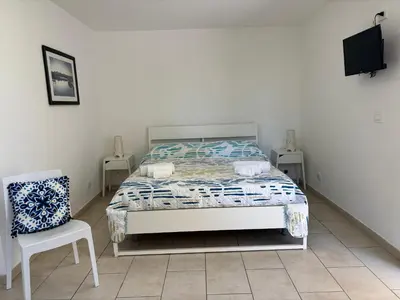 Letto o letti in una camera di Le Torrette Rooms and Apartments
