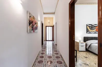 Letto o letti in una camera di Le Torrette Rooms and Apartments
