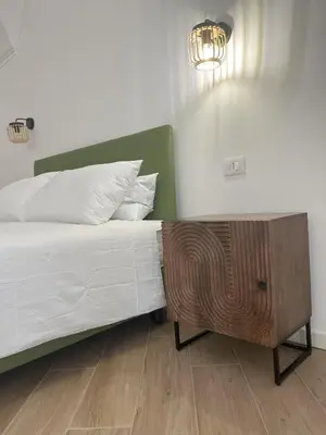Letto o letti in una camera di Ca' Semu
