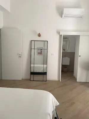 Letto o letti in una camera di Ca' Semu