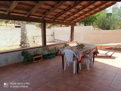 Balcone o terrazza di Villetta Tea immersa nel verde