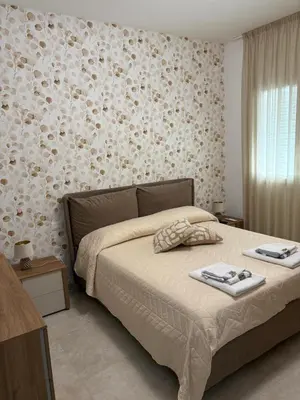 Letto o letti in una camera di Boutique Valeria