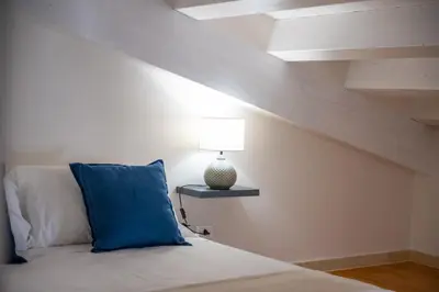 Letto o letti in una camera di Luxury B&B Maison Madre in the historic center of Avola