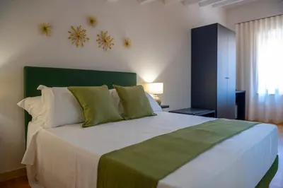 Letto o letti in una camera di Luxury B&B Maison Madre in the historic center of Avola