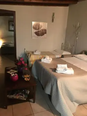 Letto o letti in una camera di Mythos Holidays & Events