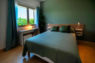 Letto o letti in una camera di Miramare Exclusive Prestige