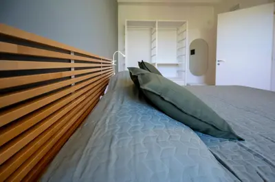 Letto o letti in una camera di Miramare Exclusive Prestige