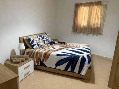 Letto o letti in una camera di Portopalo di capo Passero