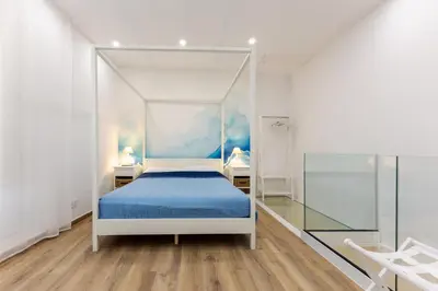 Letto o letti in una camera di La Corte e il Dammuso