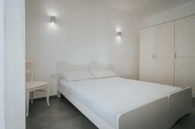 Letto o letti in una camera di Miramare