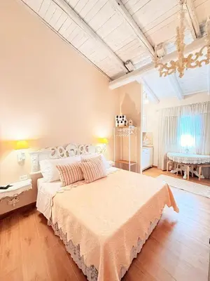 Letto o letti in una camera di Maison del Viaggiatore