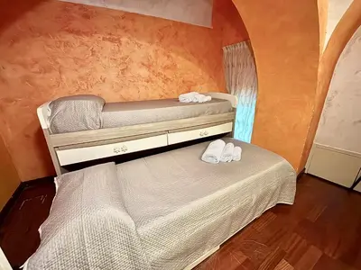 Letto o letti in una camera di La Dimora Nascosta