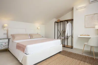 Letto o letti in una camera di Villa Mareiva - Heated Pool, Beach 150 mt