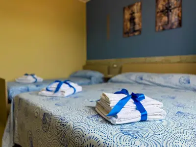Letto o letti in una camera di villa corallo
