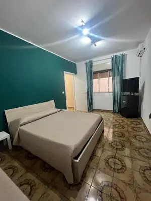 Letto o letti in una camera di Zia Lisa Home