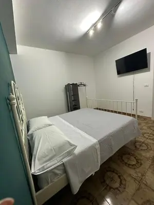 Letto o letti in una camera di Zia Lisa Home