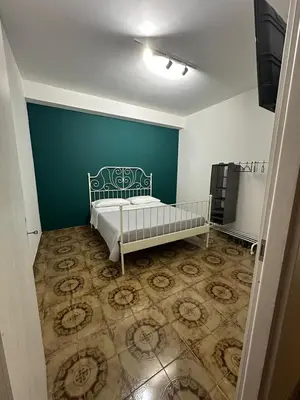 Letto o letti in una camera di Zia Lisa Home