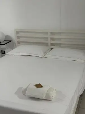 Letto o letti in una camera di In home 44
