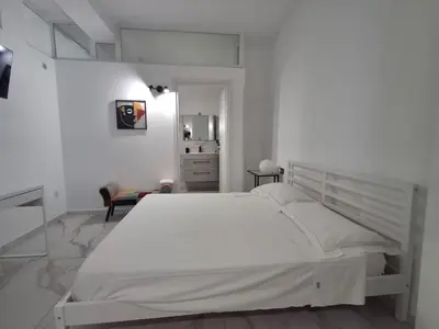 Letto o letti in una camera di In home 44