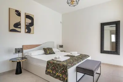 Letto o letti in una camera di Villa Medusa