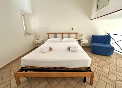 Letto o letti in una camera di Blu di Ortigia