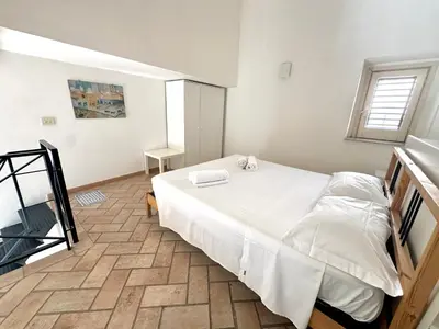 Letto o letti in una camera di Blu di Ortigia