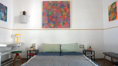 Letto o letti in una camera di Casa Ammare