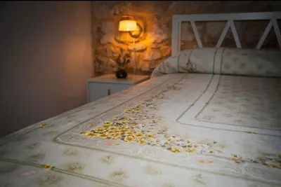 Letto o letti in una camera di Le Millesime du Soleil