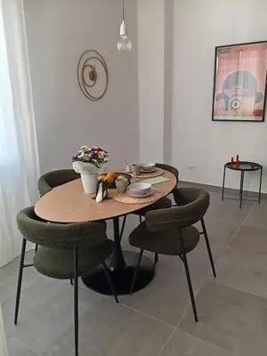 Area soggiorno di Un Monde Appart Ortigia
