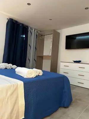 Letto o letti in una camera di The House of Giovi