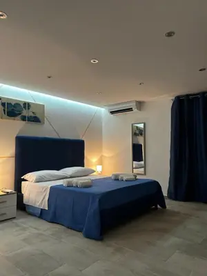 Letto o letti in una camera di The House of Giovi
