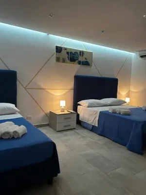 Letto o letti in una camera di The House of Giovi