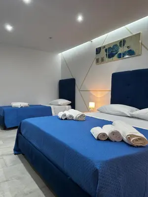Letto o letti in una camera di The House of Giovi
