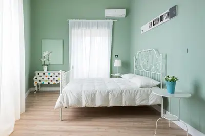Letto o letti in una camera di Duomo Housing Catania