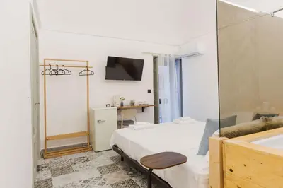 Letto o letti in una camera di Dolce Vita by Wonderful Italy