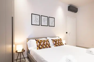 Letto o letti in una camera di Dimora Matteotti