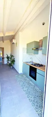 Cucina o angolo cottura di Villa LORY SWEET ORCHIDEA