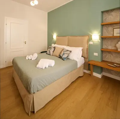 Letto o letti in una camera di Casa Lungomare Ortigia